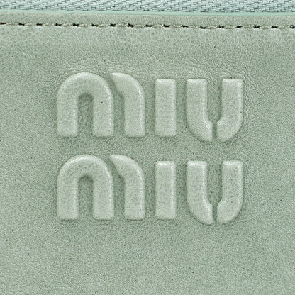 MIU MIU レディース フラグメントケース NAPPA AVIATOR 5MB066 AEFX LINFA パウダーブルー F0035