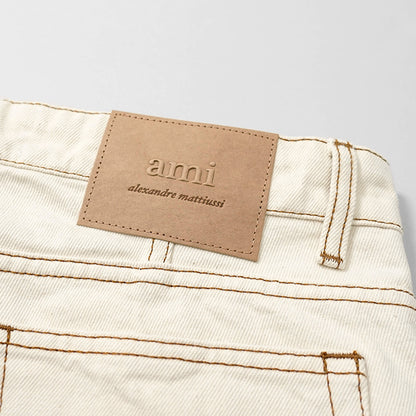【SUMMER FINAL SALE】 AMI メンズ ジーンズ HTR001 DE0039 BLANC CREME アイボリー 136