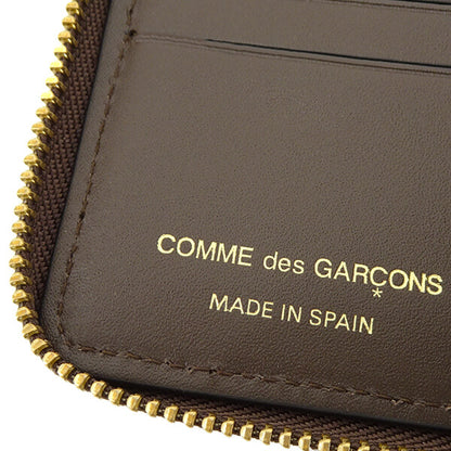 COMME des GARCONS メンズ レディース 2つ折り財布 EMBOSSED LOGOTYPE SA7100EL ブラウン BROWN