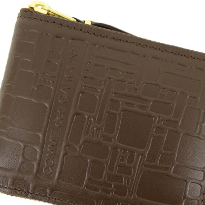 COMME des GARCONS メンズ レディース 2つ折り財布 EMBOSSED LOGOTYPE SA7100EL ブラウン BROWN
