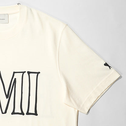 【2026SS SUMMER SALE】AMI メンズ Tシャツ AMI PARIS UTS380 726 BLANC CREME ホワイトクリーム 136