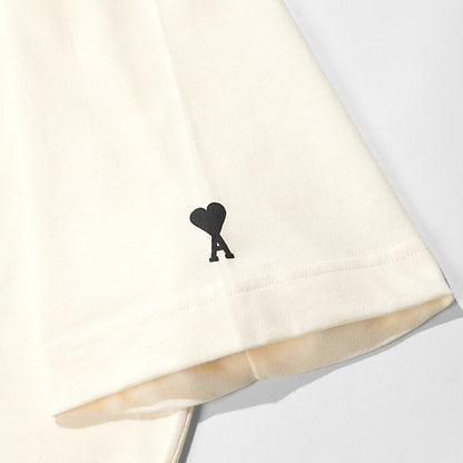 【2026SS SUMMER SALE】AMI メンズ Tシャツ AMI PARIS UTS380 726 BLANC CREME ホワイトクリーム 136
