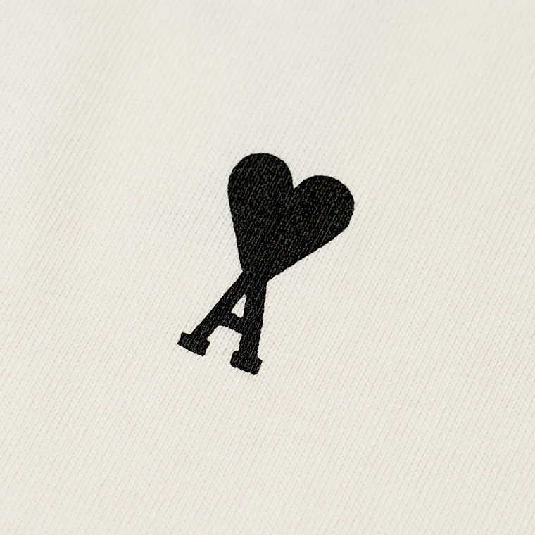 【2026SS SUMMER SALE】AMI メンズ Tシャツ AMI DE COEUR UTS387 726 BLANC CREME ホワイトクリーム 136